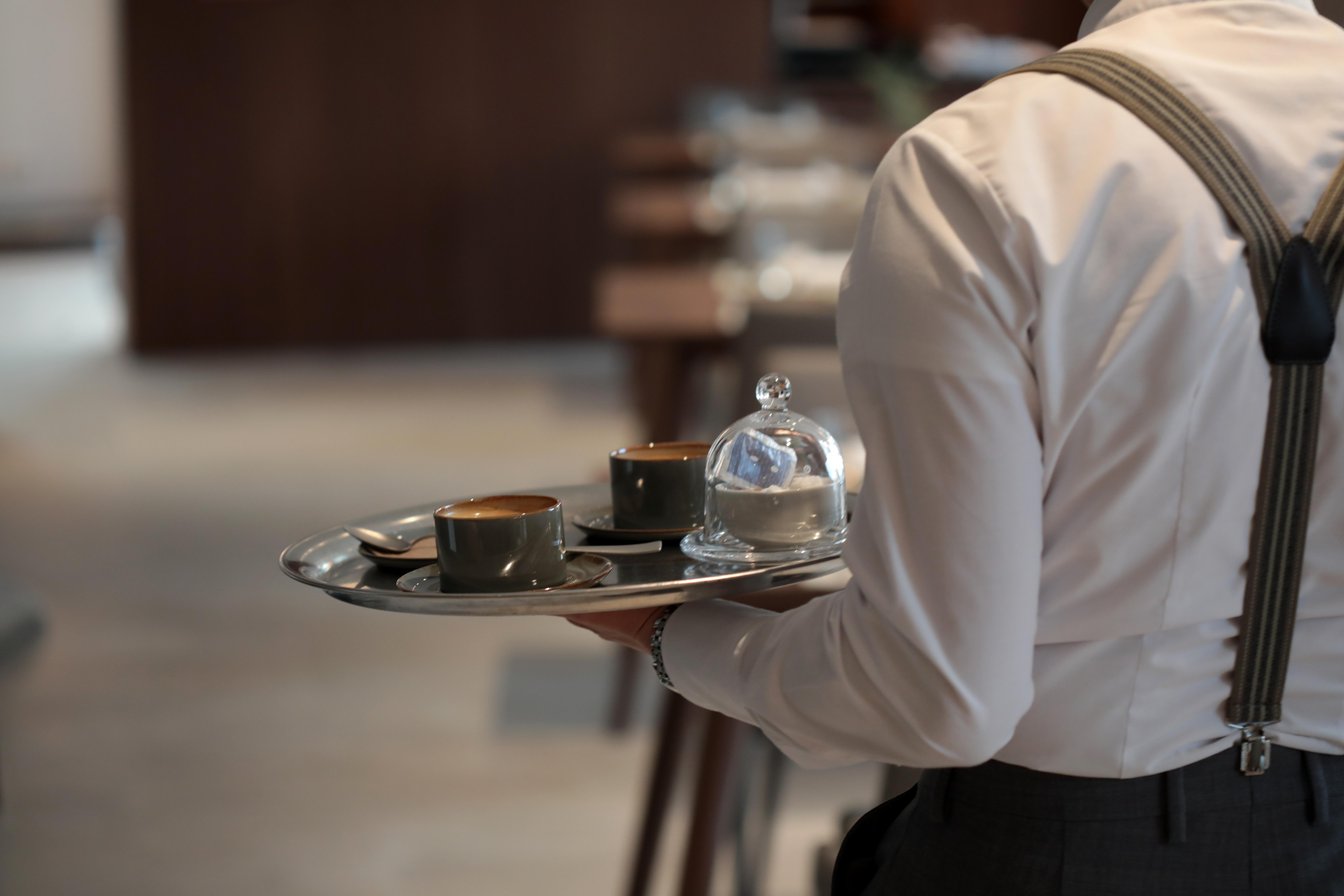 Es Princep - The Leading Hotels Of The World Palma de Mallorca Exterior photo A waiter carrying a tray